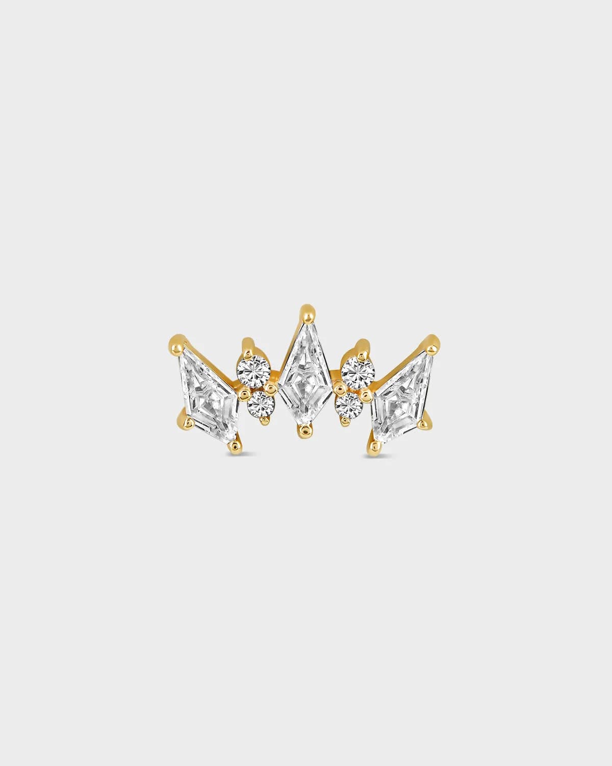 Gold and diamond earring on a white background
