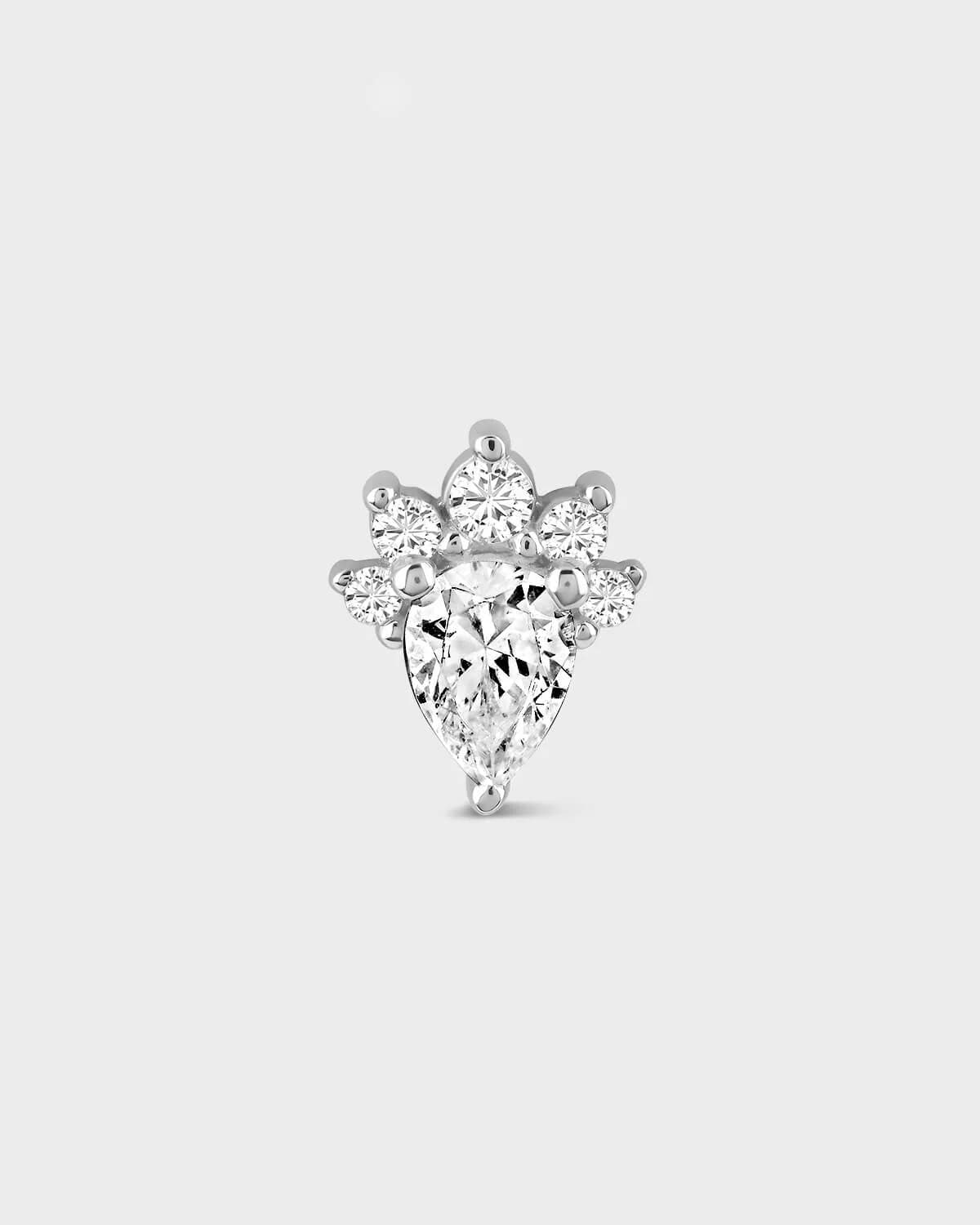 Diamond earring on a light gray background