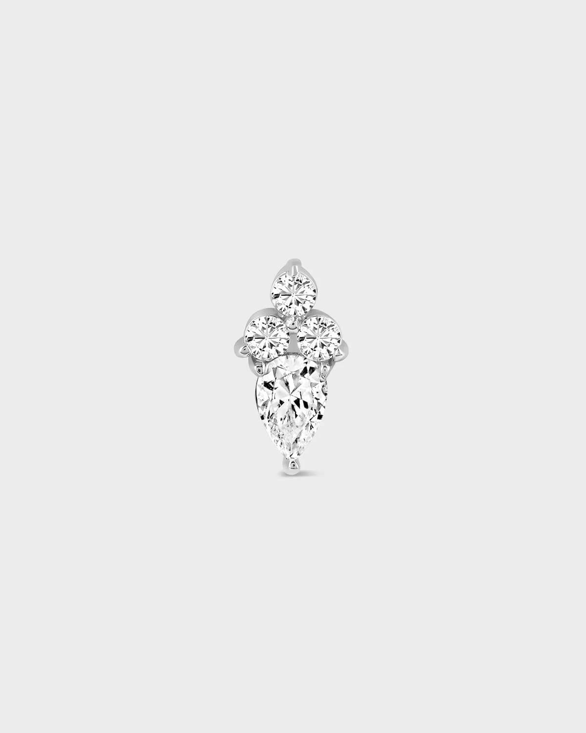 Diamond earring on a light gray background