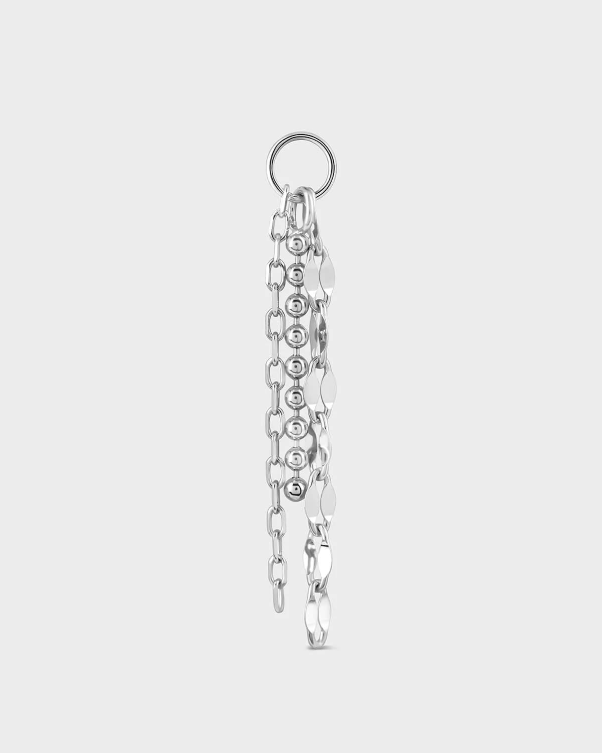 Silver chain earring on a light gray background